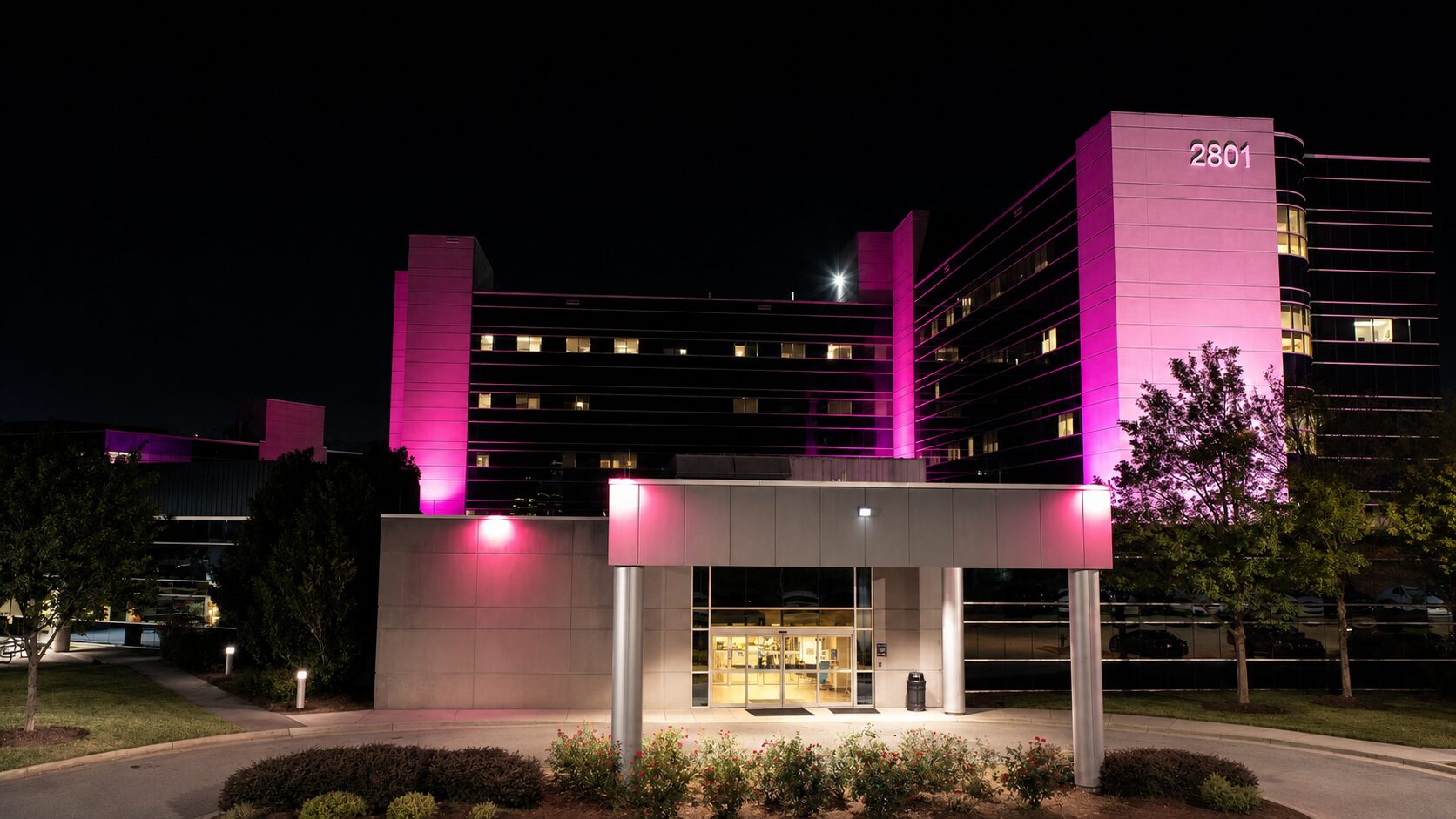 Georgia Lightscapes illuminated Emory Hillandale Hospital with dramatic pink commercial accent lighting that highlights the building’s architecture.